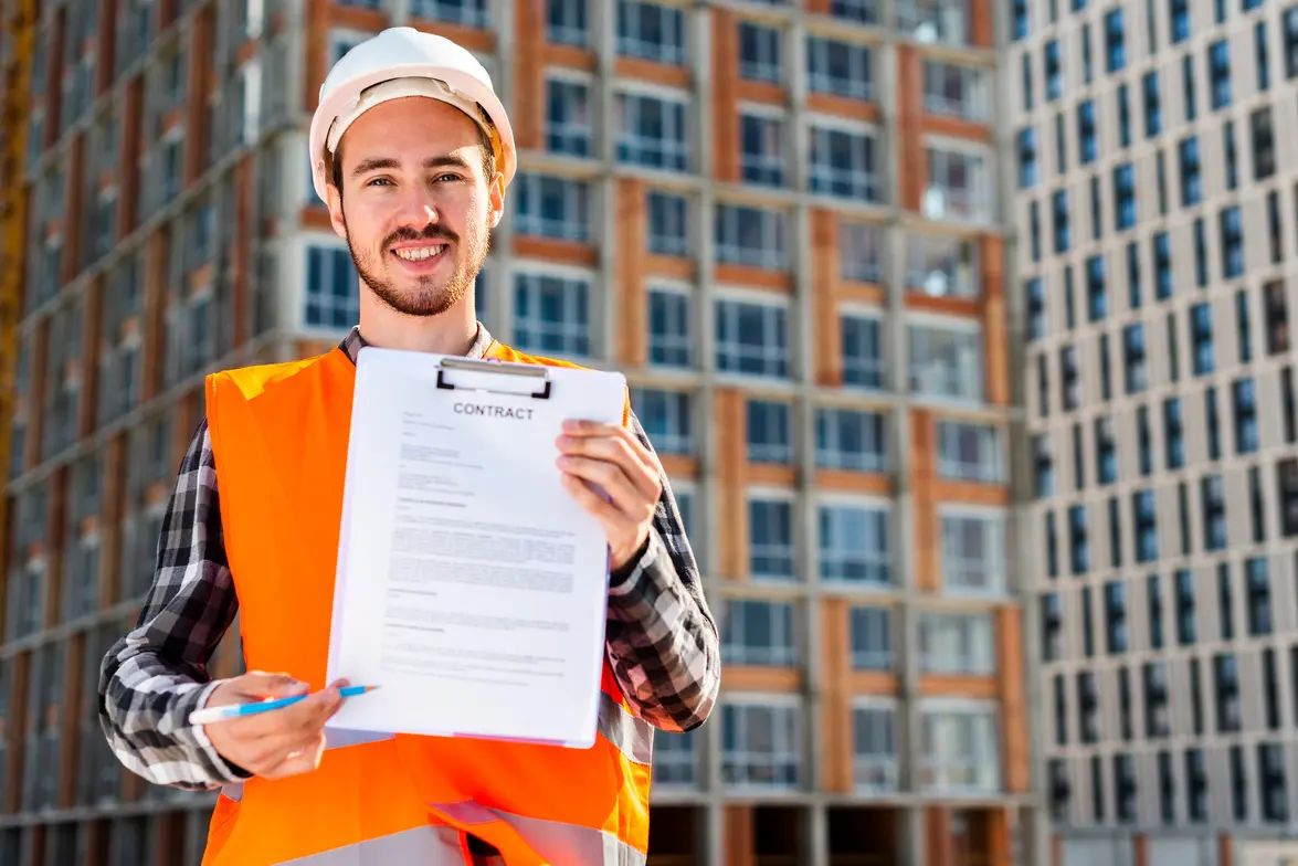 a plumber holding a licensed contract